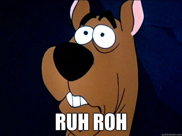 Scooby Doo animated dog with a fearful look on his face and the words "ruh roh" below
