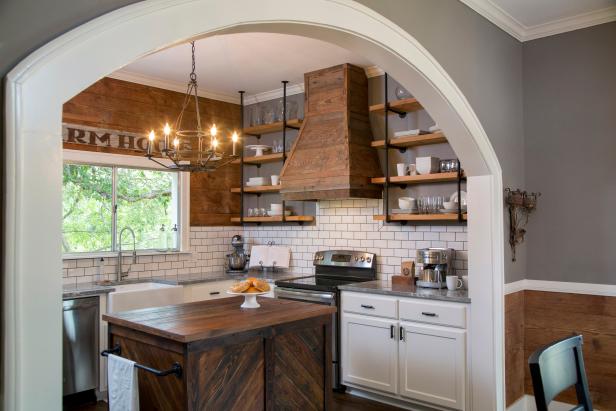 Chip and Joanna Gaines designed rustic kitchen with archway opening