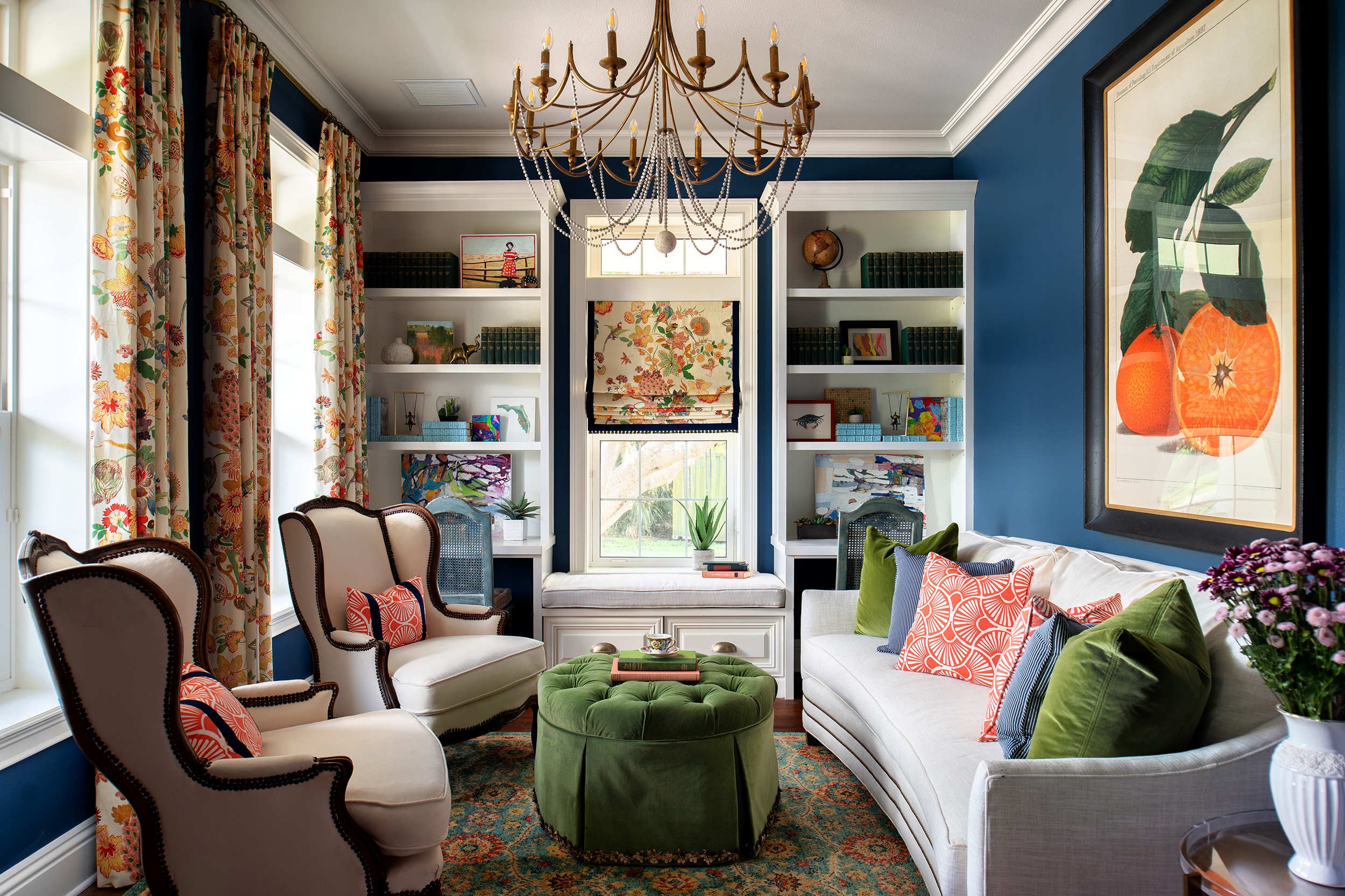 Lisa Gilmore designed colorful living room with built in seating