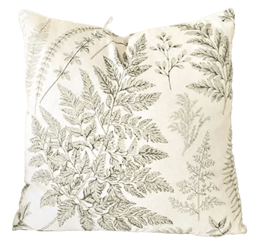 White pillow with sage green botanical fern print for sale in pairs of two. 