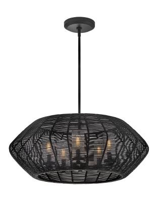 Black woven LED chandelier with a cage-like frame and soft interior lighting, inspired by high-fashion elegance and moody interiors.