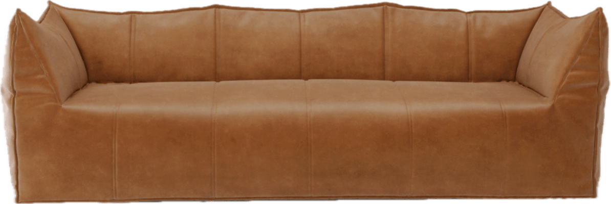 Caramel leather sofa with boxy silhouette and relaxed, lived-in style