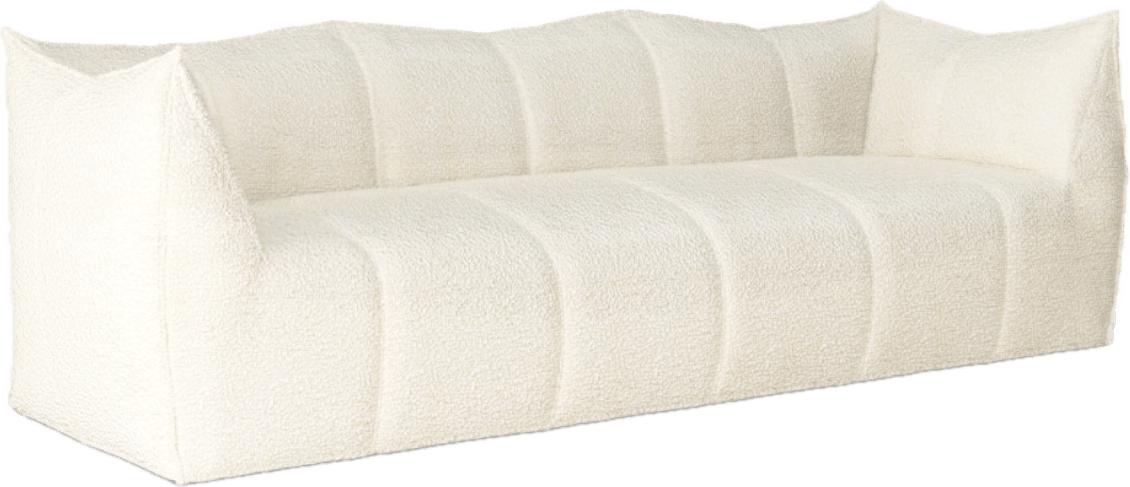 White boucle sofa with sculptural form and cozy texture